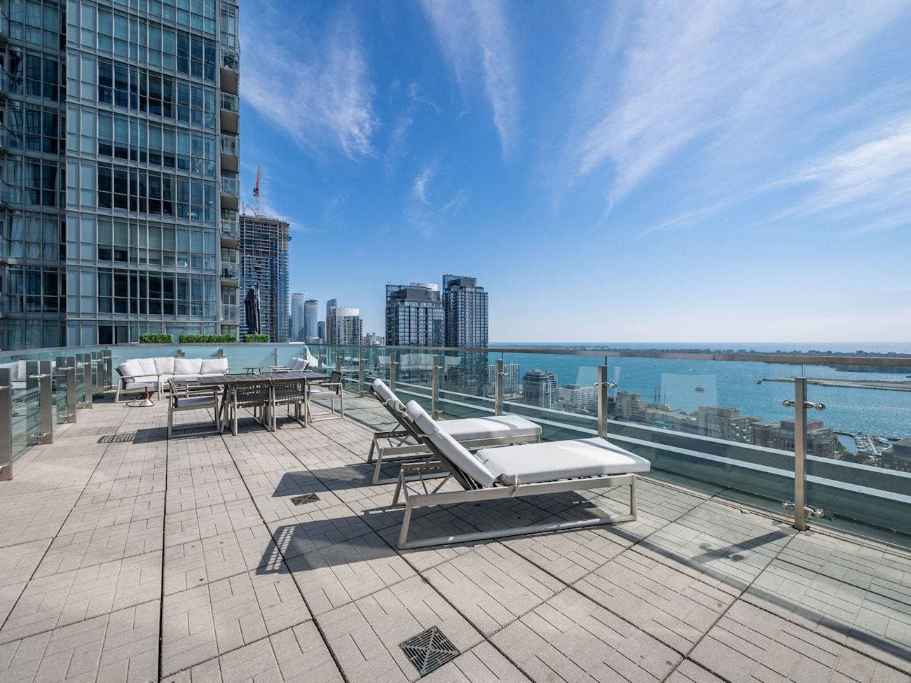 Furnished condo living room with a downtown Toronto skyline view at CityPlace