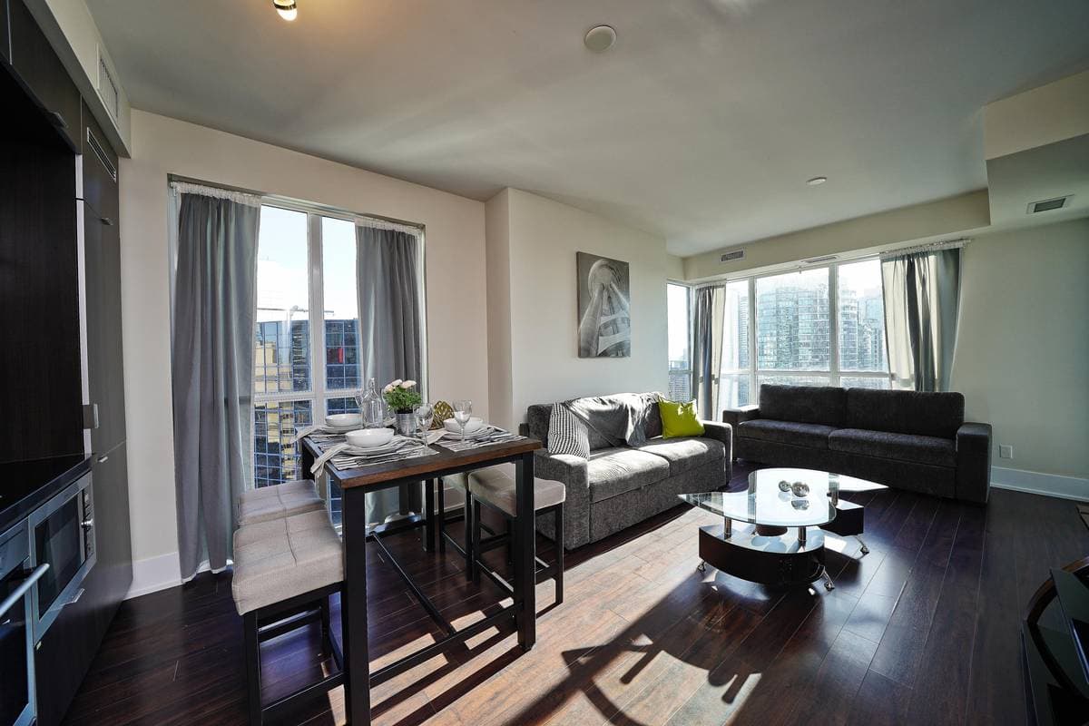 Furnished condo suite interior at The Atmos, 300 Front St W & 20 John St, Entertainment District, downtown Toronto